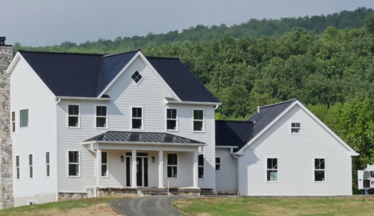 Construction of a new home with exterior services provided by Bean & Mallow Exteriors, Inc.